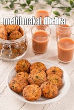 methi makai dhebra recipe | Gujarati dhebra - tea time snack | methi makai bajra dhebra | makai na vada |