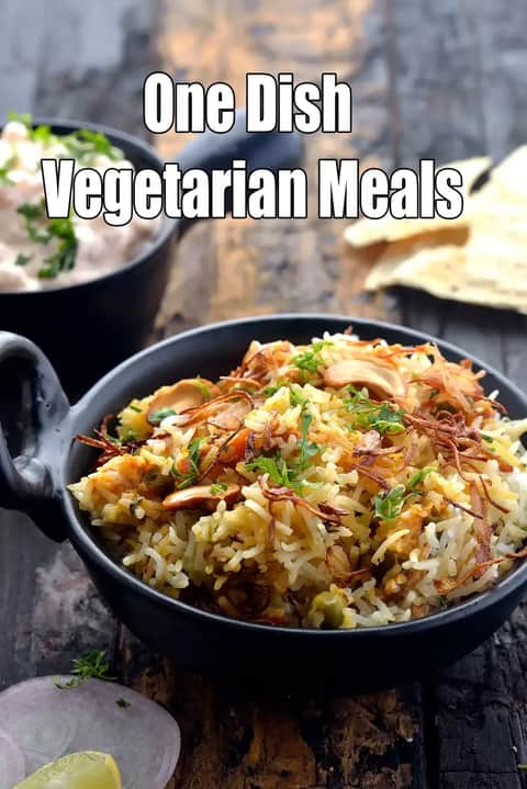 One dish vegetarian meals banner with vegetable biryani served in a black bowl on a rustic wooden table