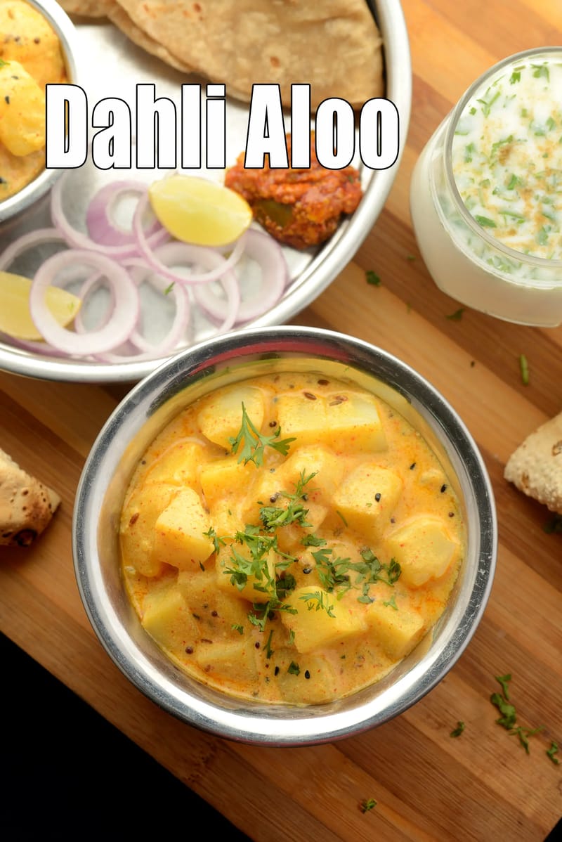 Dahi aloo recipe | dahi wale aloo ki sabzi | Rajasthani dahi wale aloo | potatoes in yogurt curry | | Tarla Dalal