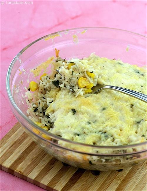 Layered Corn and Spinach Rice with Tomato Sauce recipe | Tarla Dalal