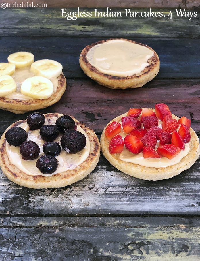 Eggless Indian pancakes with peanut butter | Eggless Indian banana oats pancakes | Eggless Indian pancakes with strawberries | healthy Indian pancake with blueberries | | Tarla Dalal