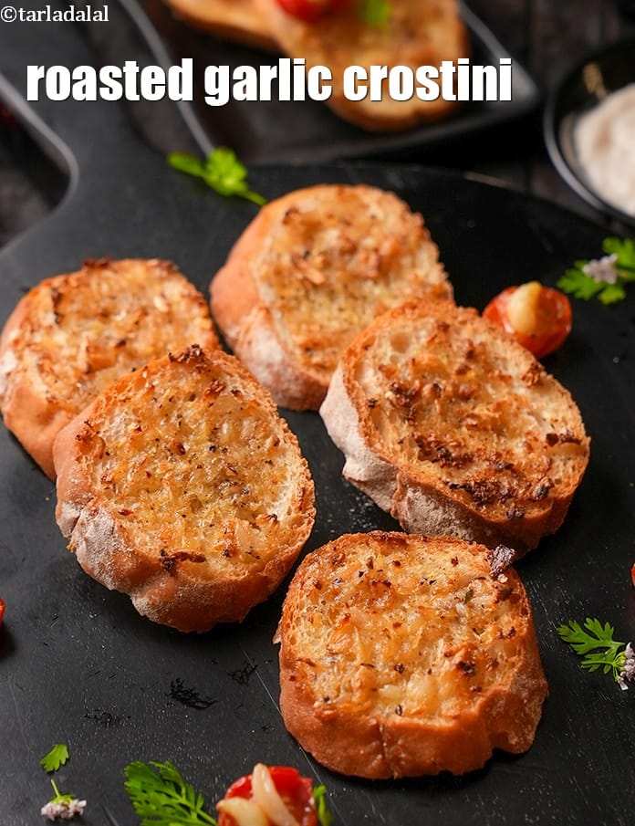 Roasted garlic crostini recipe | Indian style garlic crostini | garlic bruschetta | | Tarla Dalal