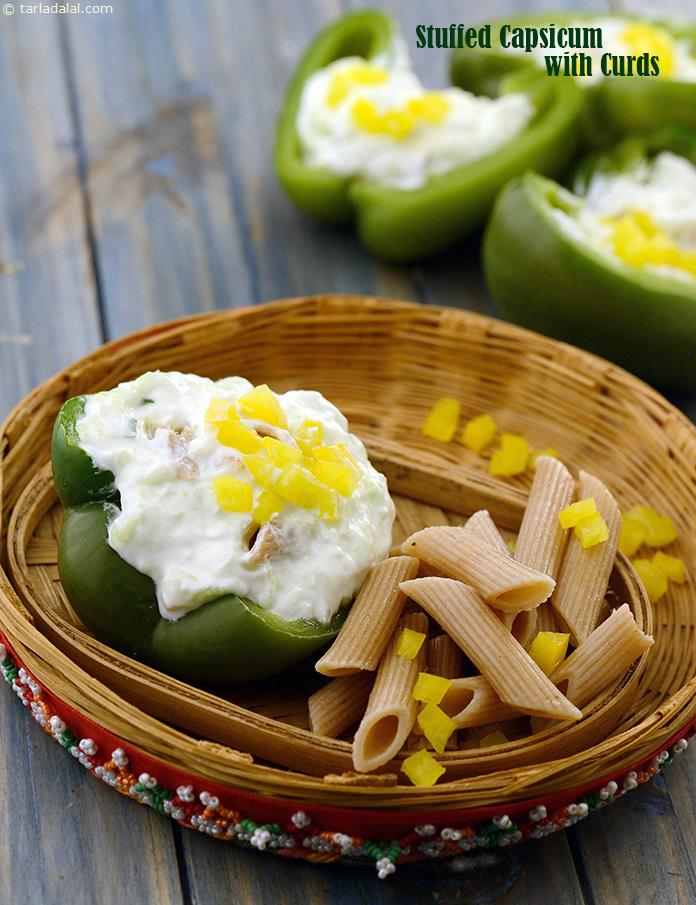 Stuffed Capsicum with Curds, Cucumber and Penne Salad recipe | Tarla Dalal