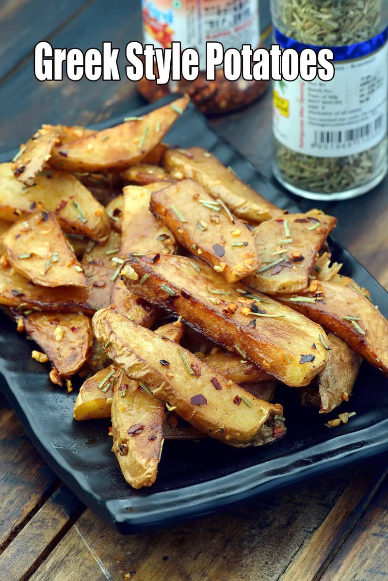 Greek Style Potatoes | deep fried Indian potato wedges | deep fried masala aloo wedges | | Tarla Dalal