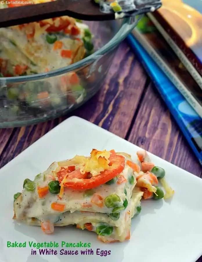 Baked Vegetable Pancakes In White Sauce With Eggs Recipe