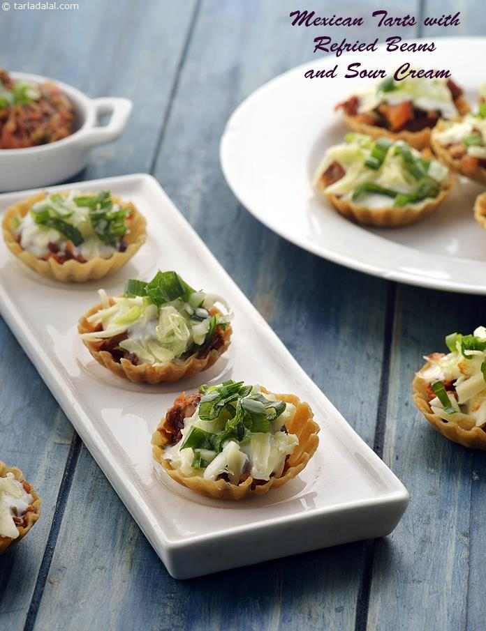 Calories in Mexican Tarts with Refried Beans and Sour Cream