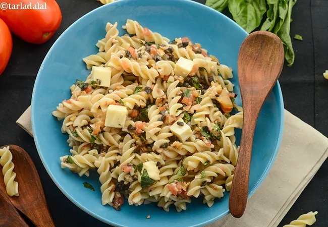 pasta salad in vinaigrette recipe | Indian style tomato pasta salad in basil vinaigrette dressing |