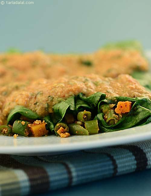 Stuffed Spinach Leaves in Tomato Gravy