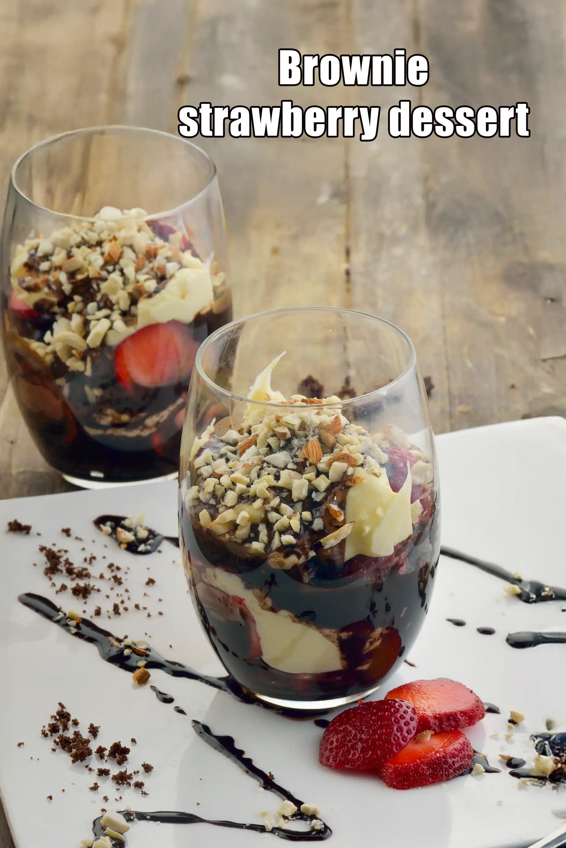 Brownie strawberry dessert recipe | eggless brownie strawberry dessert with custard and chocolate sauce | Indian style |