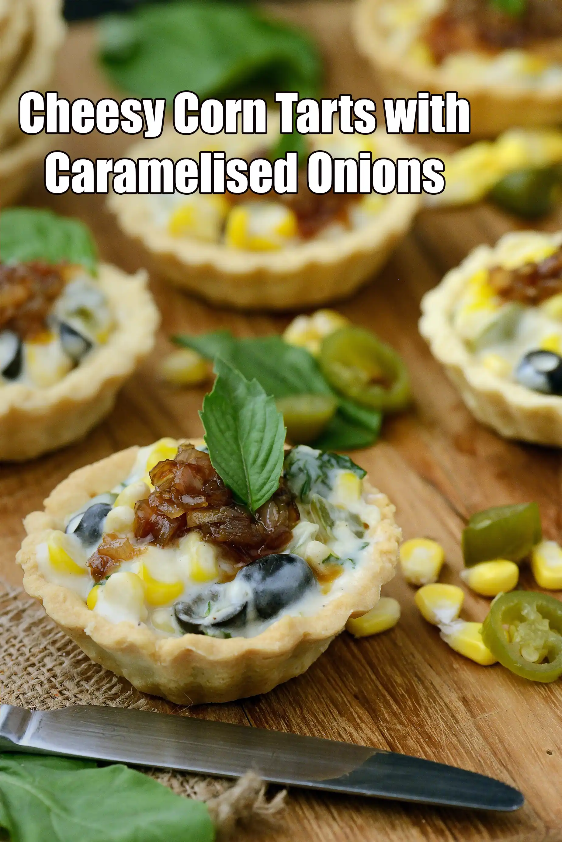 Cheesy Corn Tarts with Caramelised Onions | Savory Indian Corn Tarts |  Eggless Corn Tartlets |