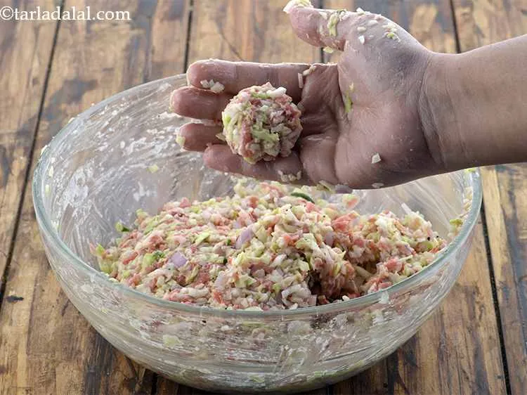 Step 12 – <p>Take small spoonfuls of the mixture in your hands and shape them into small balls. …