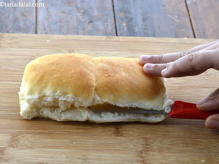 Step 24 – <p>Take 2 pavs at a time and slit them horizontally. Use a serrated knife or …