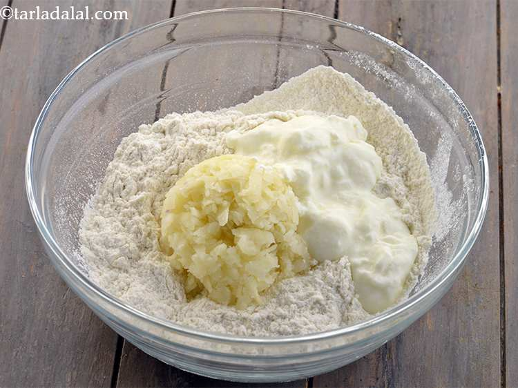 Step 33 – <p>Add the curd. This is added as we have not used yeast.&nbsp;</p>