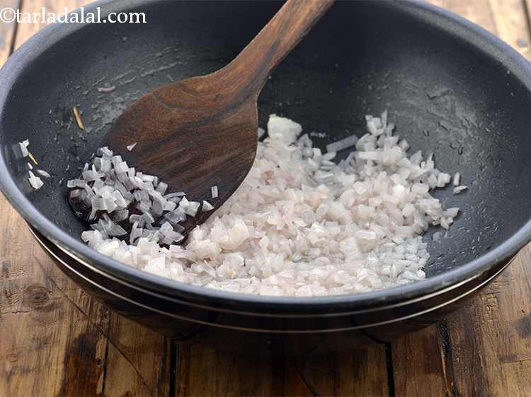 Step 13 – <p>Add the onions and sauté on a medium flame till they turn translucent.</p>