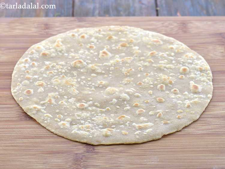 Step 34 – <p>It is advisable to use lightly cooked rotis with golden brown spots. Overcooked rotis will …