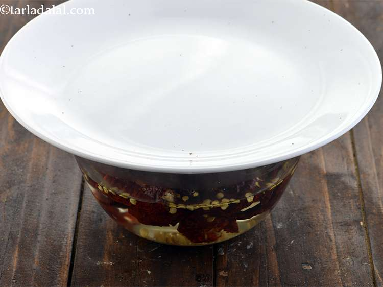 Step 4 – <p>Cover with a plate and soak them for at least 1 hour.</p>