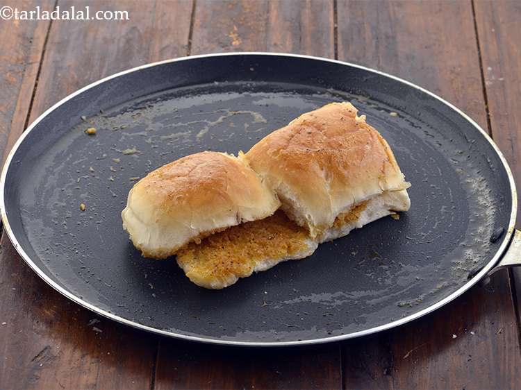 Step 34 – <p>Invert them and cook till they turn light brown and crisp.</p>