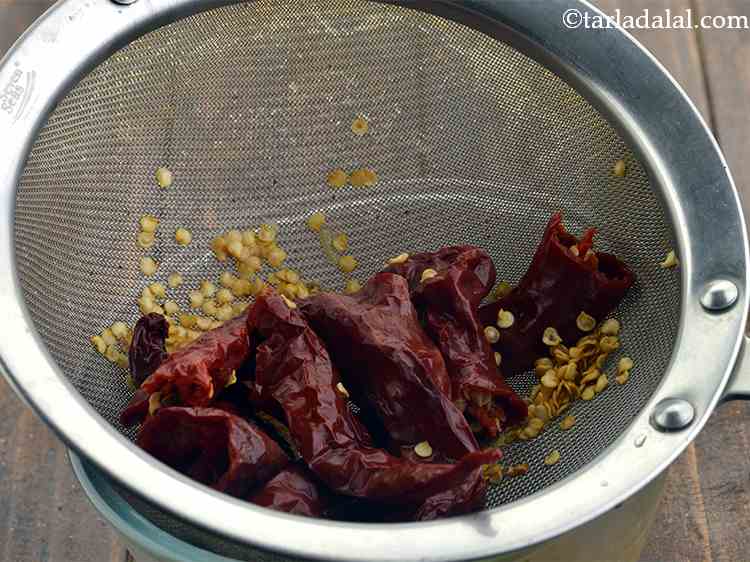 Step 6 – <p>Drain the excess water with the help of a strainer.</p>