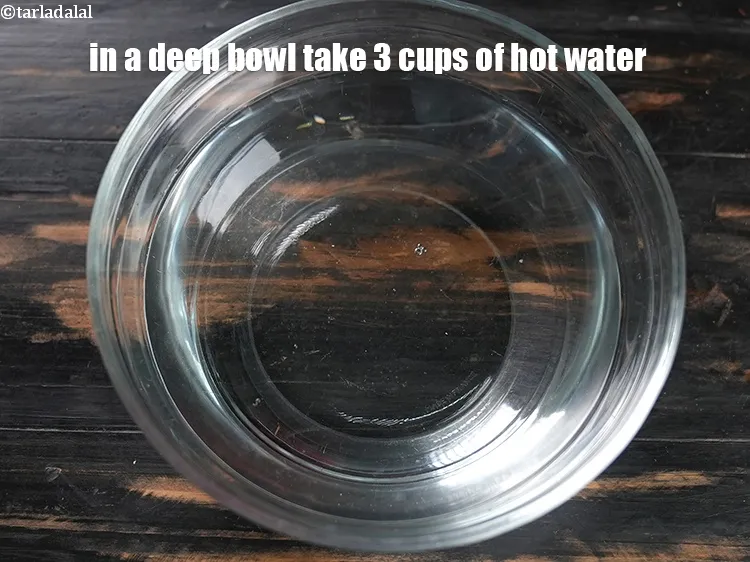 Step 3 – To make <strong>mushroom onion sou</strong>p, in a deep bowl take 3 cups of hot water.