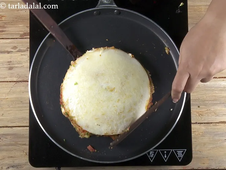 Step 38 – While turning it over each time, do so with 2 flat ladles.&nbsp;