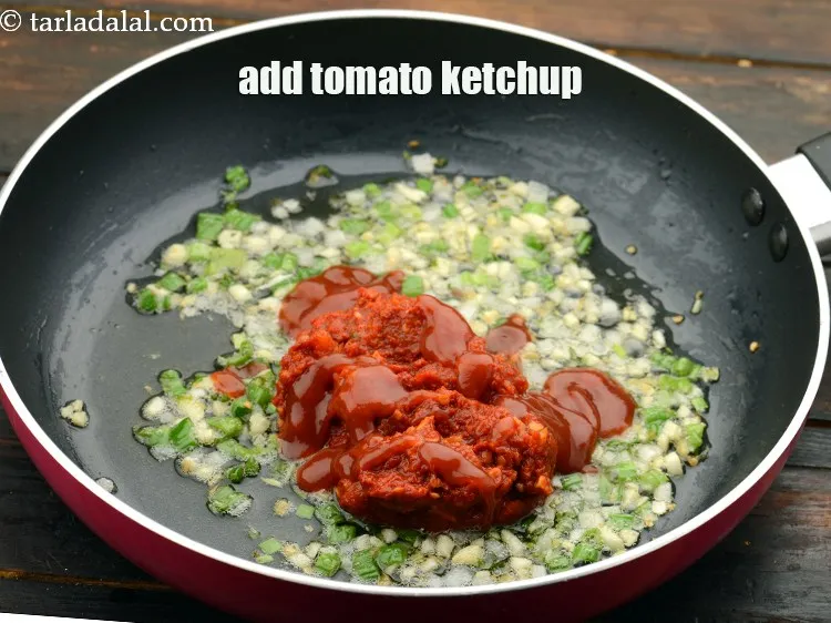 Step 30 – Add&nbsp;1 tbsp&nbsp;<a href="https://www.tarladalal.com/glossary-tomato-ketchup-tomato-sauce-181i">tomato ketchup</a>.