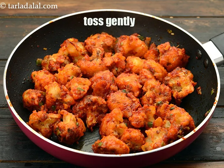 Step 36 – Toss <strong>cauliflower in Schezuan sauce recipe | spicy gobi Schezwan | Indo Chinese Schezuan style …