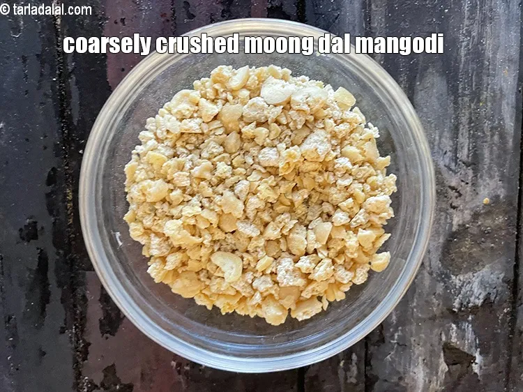 Step 4 – <meta charset="UTF-8" />You coarsely crush the mongodi to use in the methi mangodi sabji.&nbsp;&nbsp;<br /> …