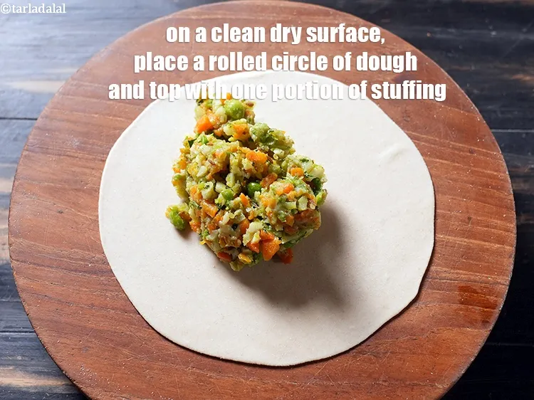 Step 35 – Place a rolled circle on a clean, dry surface, spread one portion of the stuffing …