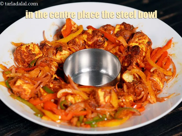 Step 28 – In the centre place the steel bowl.&nbsp;