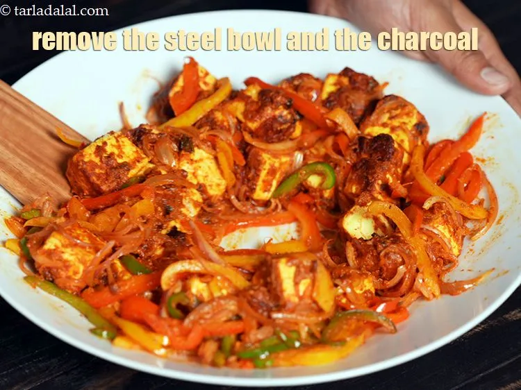 Step 31 – Once done, remove the steel bowl and the charcoal and keep the stuffing aside.&nbsp;