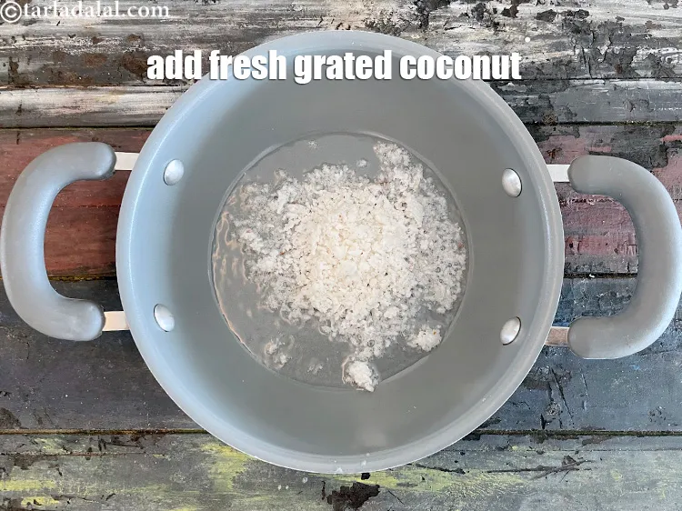 Step 11 – <span style="font-family:Arial,sans-serif">Add &frac12; cup&nbsp;</span><meta charset="UTF-8" />fresh&nbsp;<a href="glossary-grated-coconut-852i">grated coconut</a>.