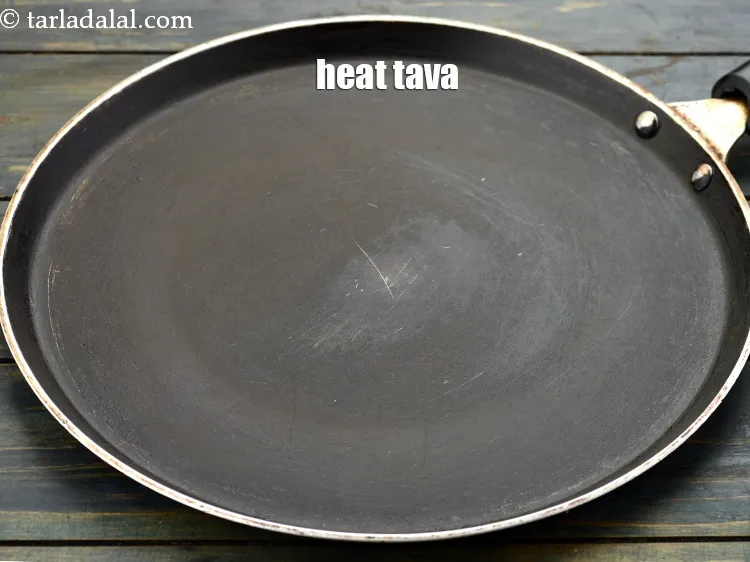 Step 23 – <p>Heat a non-stick tava (griddle).</p>