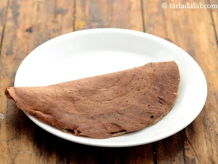 Step 32 – Transfer to a plate. Repeat with the remaining batter to make 11 more dosas.