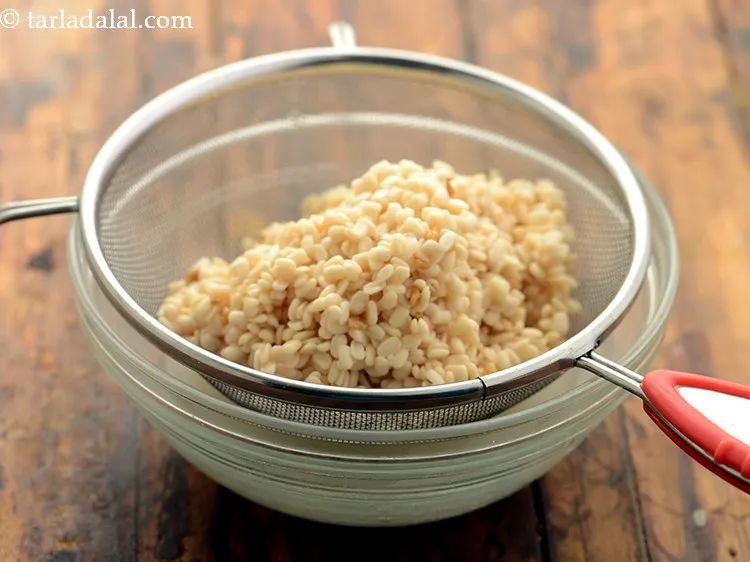 Step 11 – Drain the soaked urad dal and methi dana.
