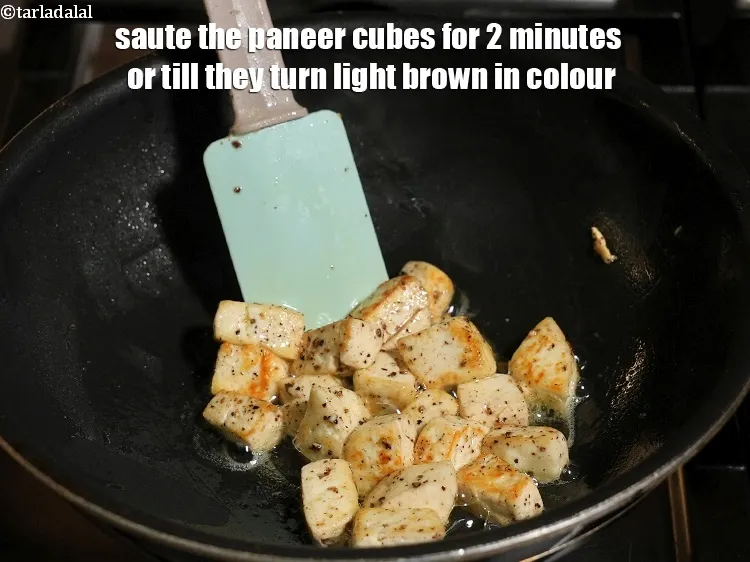 Step 24 – Saute the paneer cubes for 2&nbsp;minutes or&nbsp;till they turn light brown in colour.&nbsp;