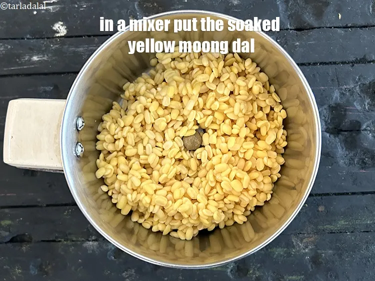 Step 10 – In a mixer put soaked and drained&nbsp;yellow moong dal.