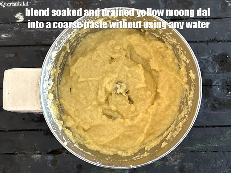 Step 11 – Blend soaked and drained&nbsp;yellow moong dal&nbsp;in a mixer to a coarse paste without using any …