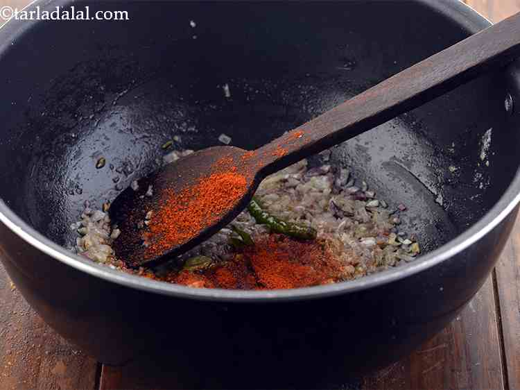 Step 20 – <p>Now add the red chilli powder.</p>