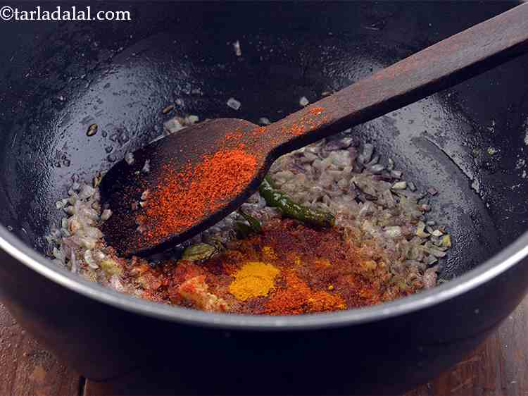 Step 21 – <p>Then add the turmeric powder. It not only adds colour but also has innumerable health …