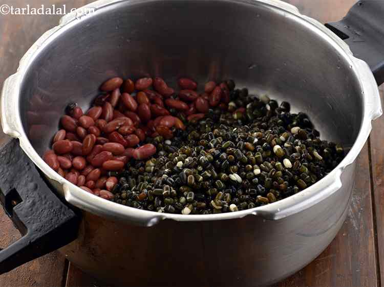 Step 7 – <p>Drain the water, rinse them in running water and transfer the whole urad dal and …