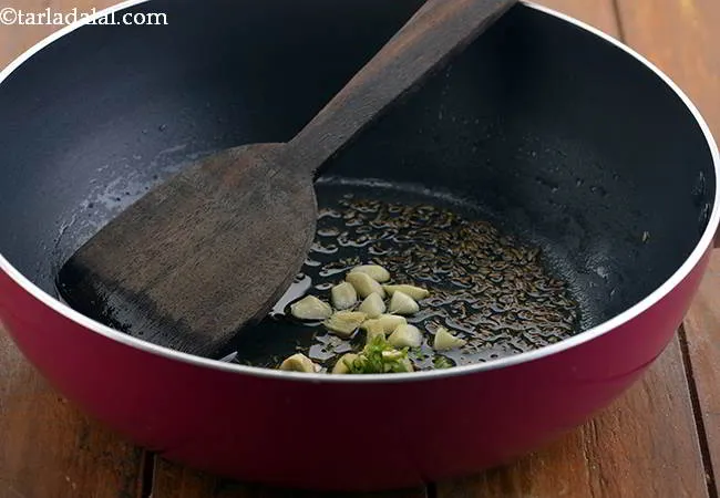 Step 7 – Then add the ginger. This adds an earthiness to the&nbsp;<strong>Aloo Methi.&nbsp;&nbsp;</strong>Now add the green chillies …