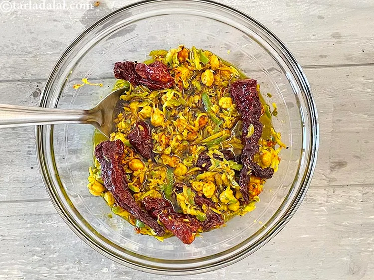 Step 33 – Mix <strong>aam aur chane ka achar&nbsp;</strong>well.