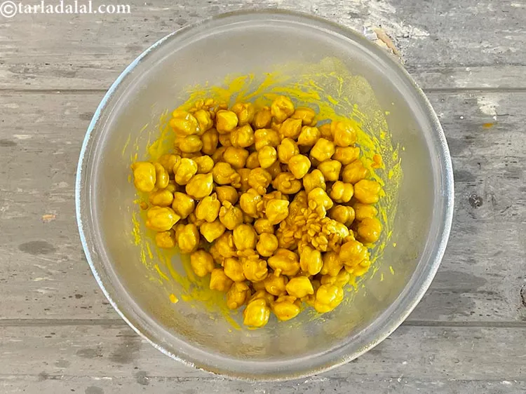 Step 20 – This is what it looks like after soaking the chick peas in raw mango water. …