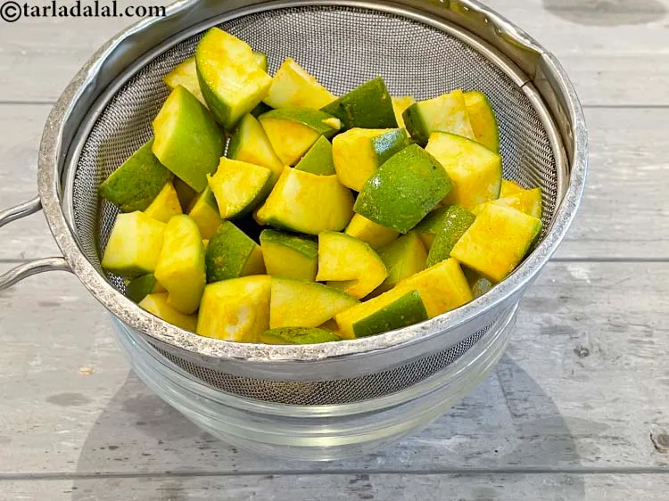 Step 11 – You can see that the sieve is place over a glass bowl.