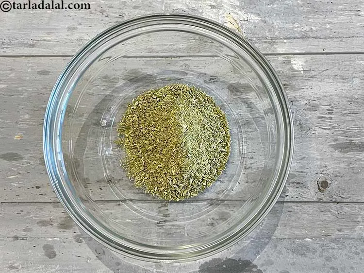 Step 16 – In a bowl put&nbsp;<meta charset="UTF-8" />1/4 cup&nbsp;<a href="glossary-fennel-seeds-saunf-sauf-410i">fennel seeds (saunf)</a>&nbsp;, coarsely ground.