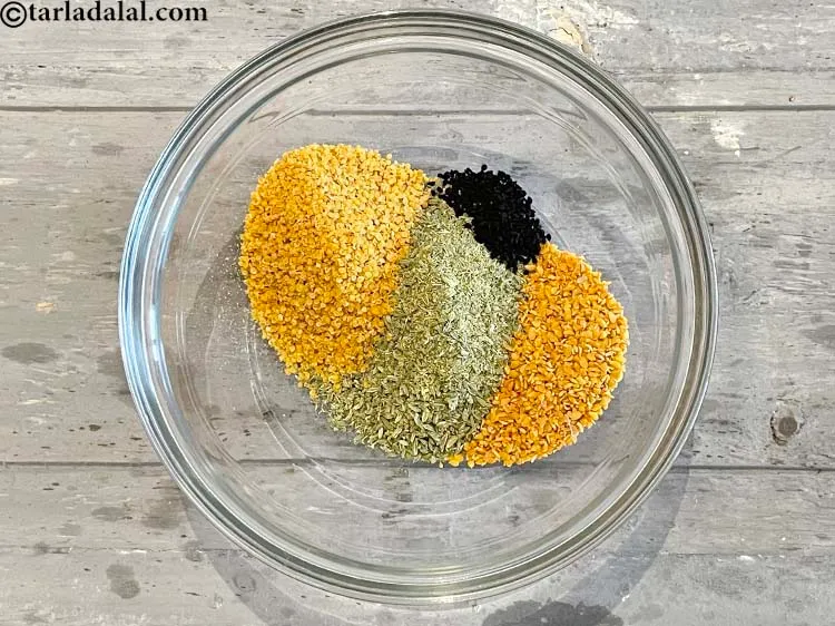 Step 19 – Add&nbsp;<meta charset="UTF-8" />1/2 tsp&nbsp;<a href="glossary-nigella-seeds-kalonji-onion-seeds-552i">nigella seeds (kalonji)</a>.