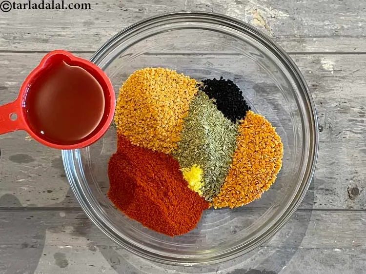 Step 22 – Add 3/4 cup&nbsp;<a href="glossary-mustard-oil-rai-ka-tel-sarson-ka-tel-942i">mustard (rai / sarson) oil</a>.