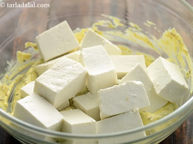 Step 15 – Add the paneer to the prepared achaari marinade. Learn how to make cottage cheese with …