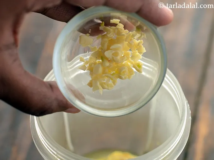 Step 2 – Add chopped garlic. Alternatively, you can also use garlic paste.