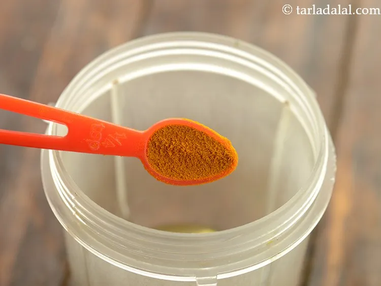 Step 8 – Add turmeric powder.